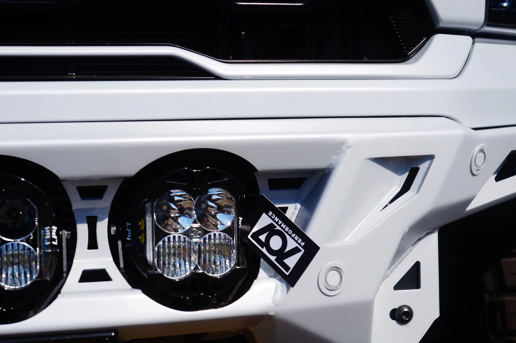 Custom white bumper lighting detail