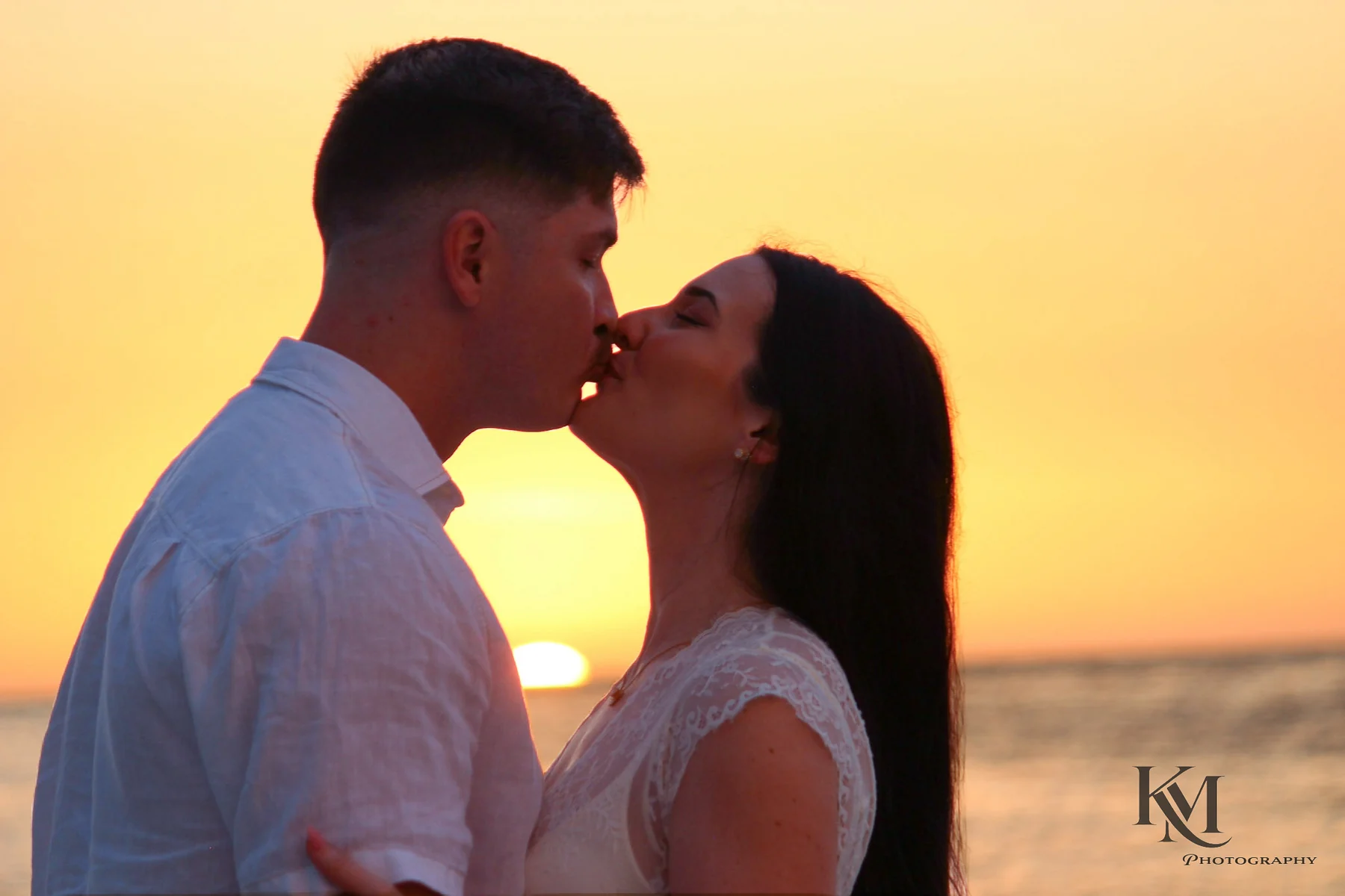 Couple portrait photographed at sunset